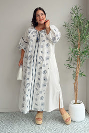 Model Maddy wearing size 22 of the Whitehaven Beach Cotton Maxi Dress in colour Whiteblue (Blue), from the front, showing the whole outfit