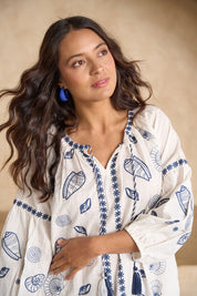 Model Tahnee wearing size 10 of the Whitehaven Beach Cotton Maxi Dress in colour Whiteblue (Blue), from the front, cropped image