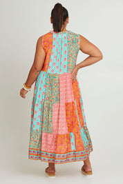 Model Ashleigh wearing size 16 of the Diamond Beach Sleeveless Dress in colour Bright, from the back
