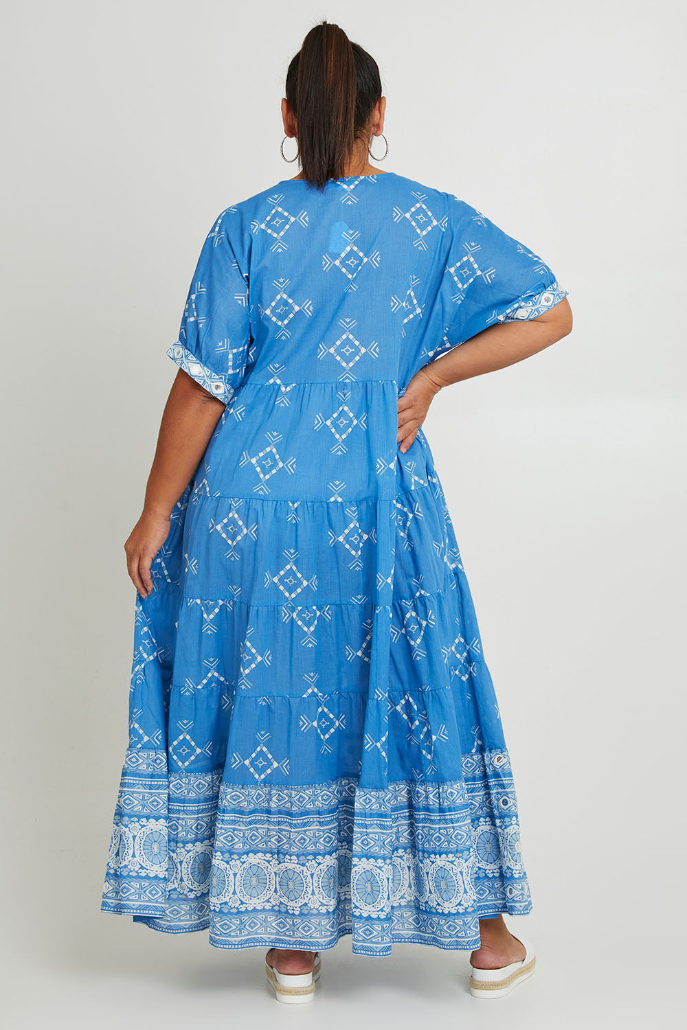 Model Ashleigh wearing size 16 of the Dee Why Beach Cotton Maxi Dress in colour Lightblue (Blue), from the back