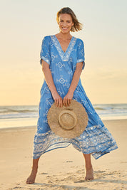 Model Riina wearing size 10 of the Dee Why Beach Cotton Maxi Dress in colour Lightblue (Blue), from the front, showing the whole outfit