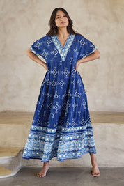 Model Tahneei wearing size 10 of the Dee Why Beach Cotton Maxi Dress – Navy in colour Navy, from the front