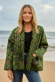 Model Maggie wearing size 10 of the Edith Falls Jacket in colour Aztec (Green), from the front, showing the whole outfit