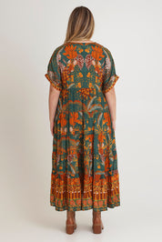 Model Chanel wearing size 16 of the Wentworth Falls Maxi Dress in colour Leopard, from the back