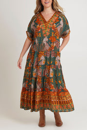 Model Chanel wearing size 16 of the Wentworth Falls Maxi Dress in colour Leopard, from the front, cropped image