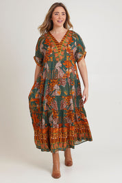 Model Chanel wearing size 16 of the Wentworth Falls Maxi Dress in colour Leopard, from the front, showing the whole outfit