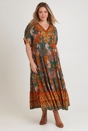 Model Chanel wearing size 16 of the Wentworth Falls Maxi Dress in colour Leopard, from the front, showing the whole outfit