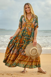 Model Maggie wearing size 10 of the Wentworth Falls Maxi Dress in colour Leopard, from the front, showing the whole outfit