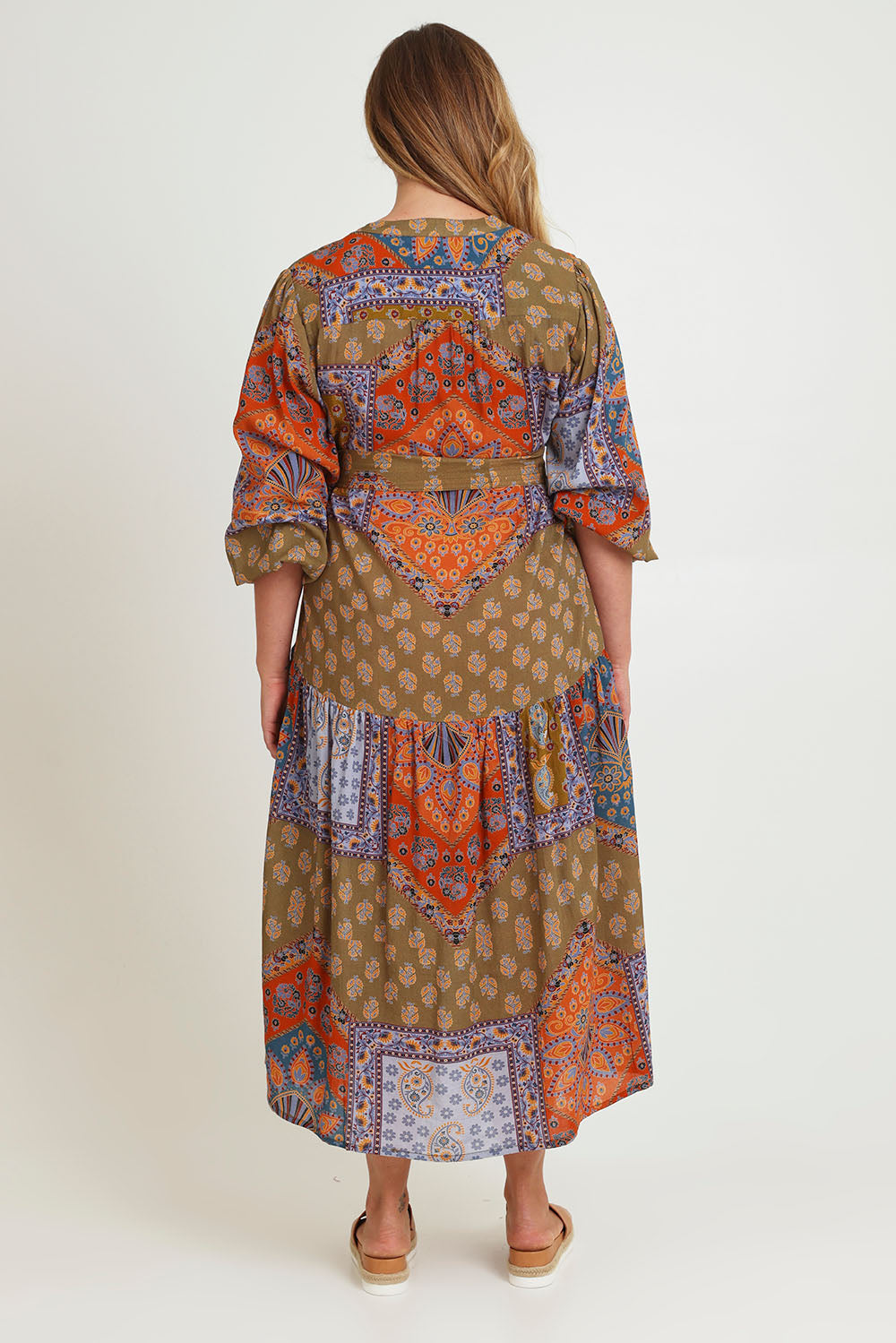 Model Chanel wearing size 16 of the Florance Falls Maxi Dress in colour Paisley, from the back