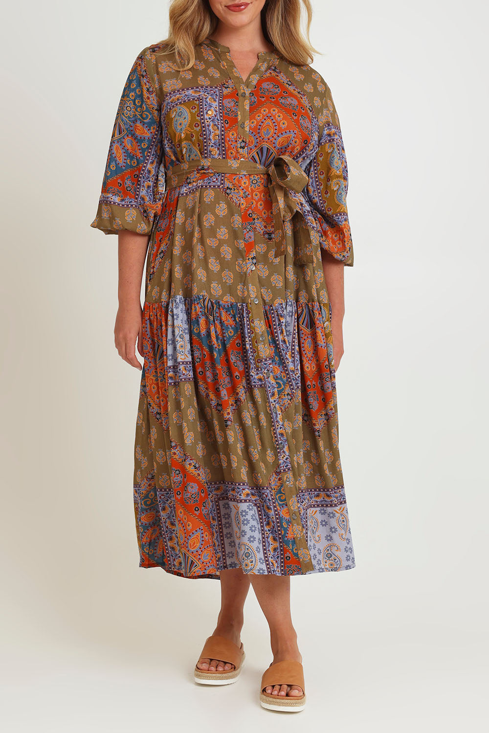 Model Chanel wearing size 16 of the Florance Falls Maxi Dress in colour Paisley, from the front, cropped image