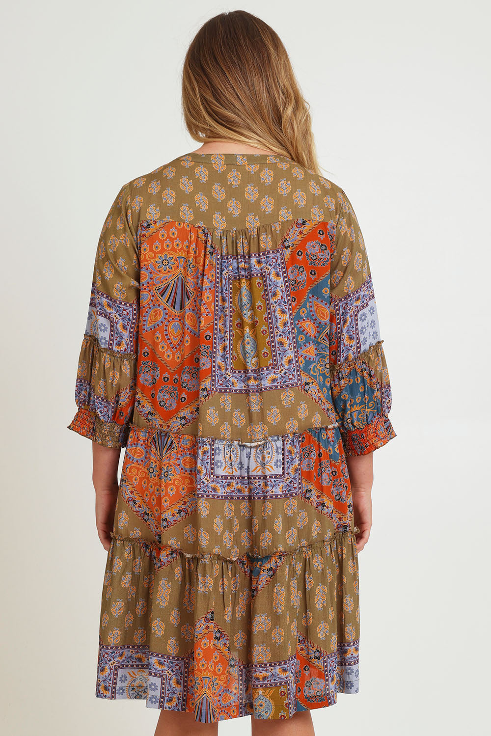 Model Chanel wearing size 16 of the Florance Falls Dress in colour Paisley, from the back