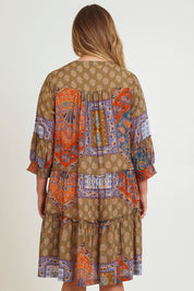 Model Chanel wearing size 16 of the Florance Falls Dress in colour Paisley, from the back