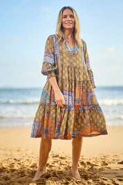 Model Maggie wearing size 10 of the Florance Falls Dress in colour Paisley, from the front, showing the whole outfit