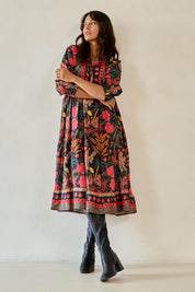 Model Tahnee wearing size 10 of the Florance Falls Dress in colour Wilderness, from the front, showing the whole outfit