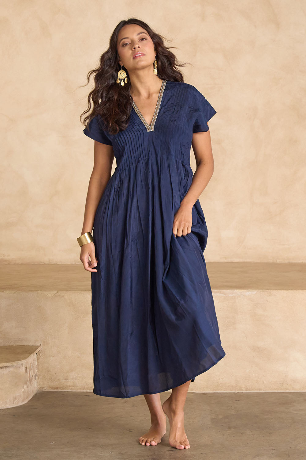 Model Tahnee wearing size 10 of the San Rafael Falls Kimono Dress in colour Deepsea (Blue), from the front, showing the whole outfit