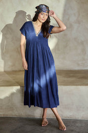 Model Tahneei wearing size 10 of the San Rafael Falls Kimono Dress – Deepsea in colour Deepsea, from the front