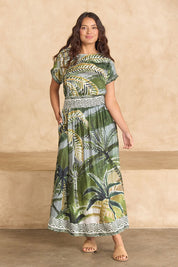 Model Tahnee wearing size 10 of the Palm Cove Top in colour Tropical (Green), from the front, showing the whole outfit