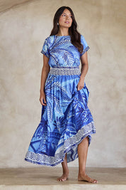 Model Tahneei wearing size 10 of the Palm Cove Long Skirt – Blue in colour Blue, from the front
