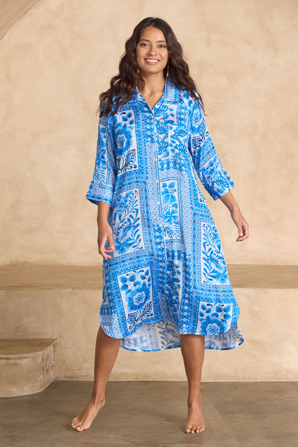 Model Tahnee wearing size 10 of the Sapphire Beach Shirt Dress in colour Bluewhite (Blue), from the front, showing the whole outfit