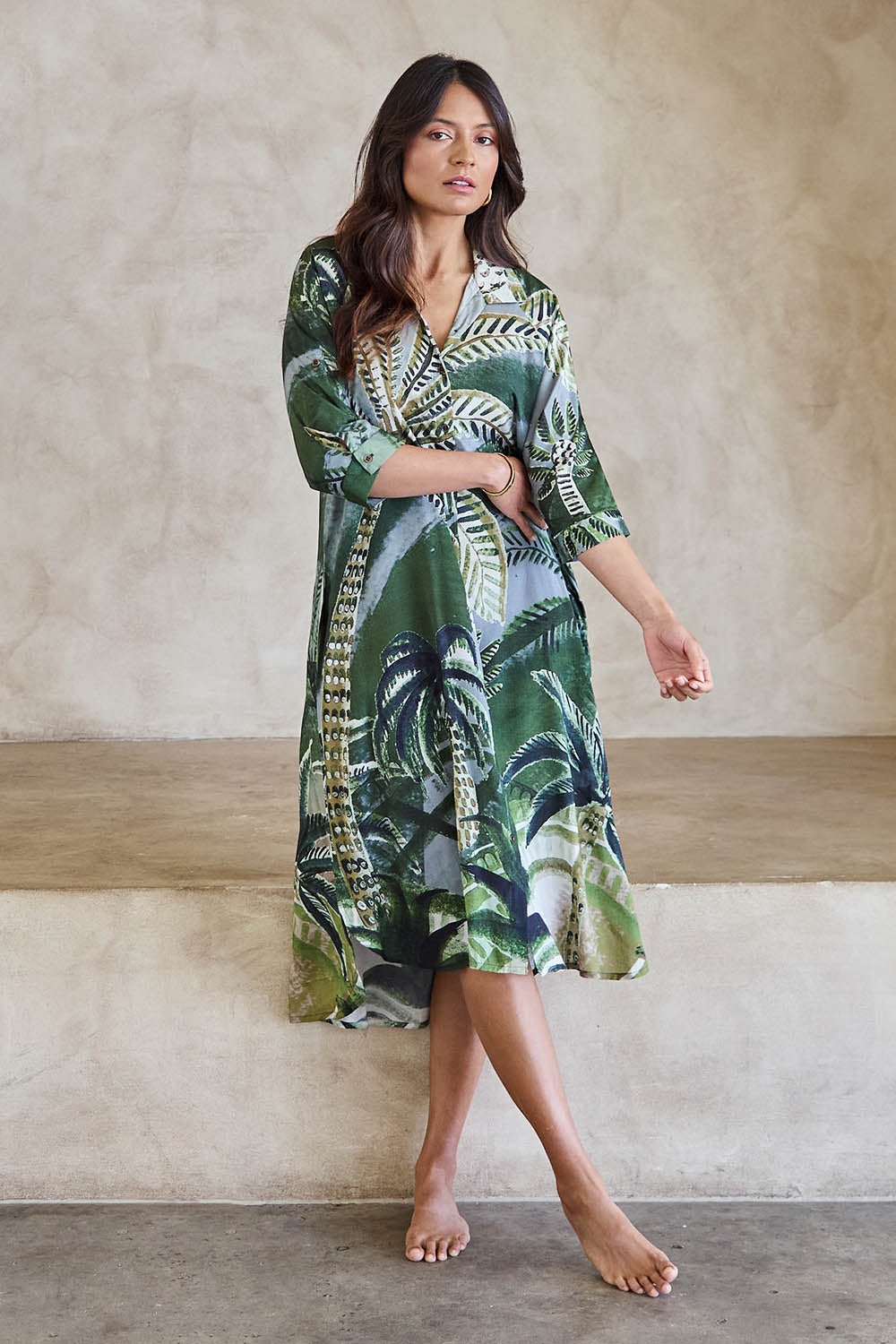 Model Tahneei wearing size 10 of the Sapphire Beach Shirt Dress – Tropical in colour Tropical, from the front