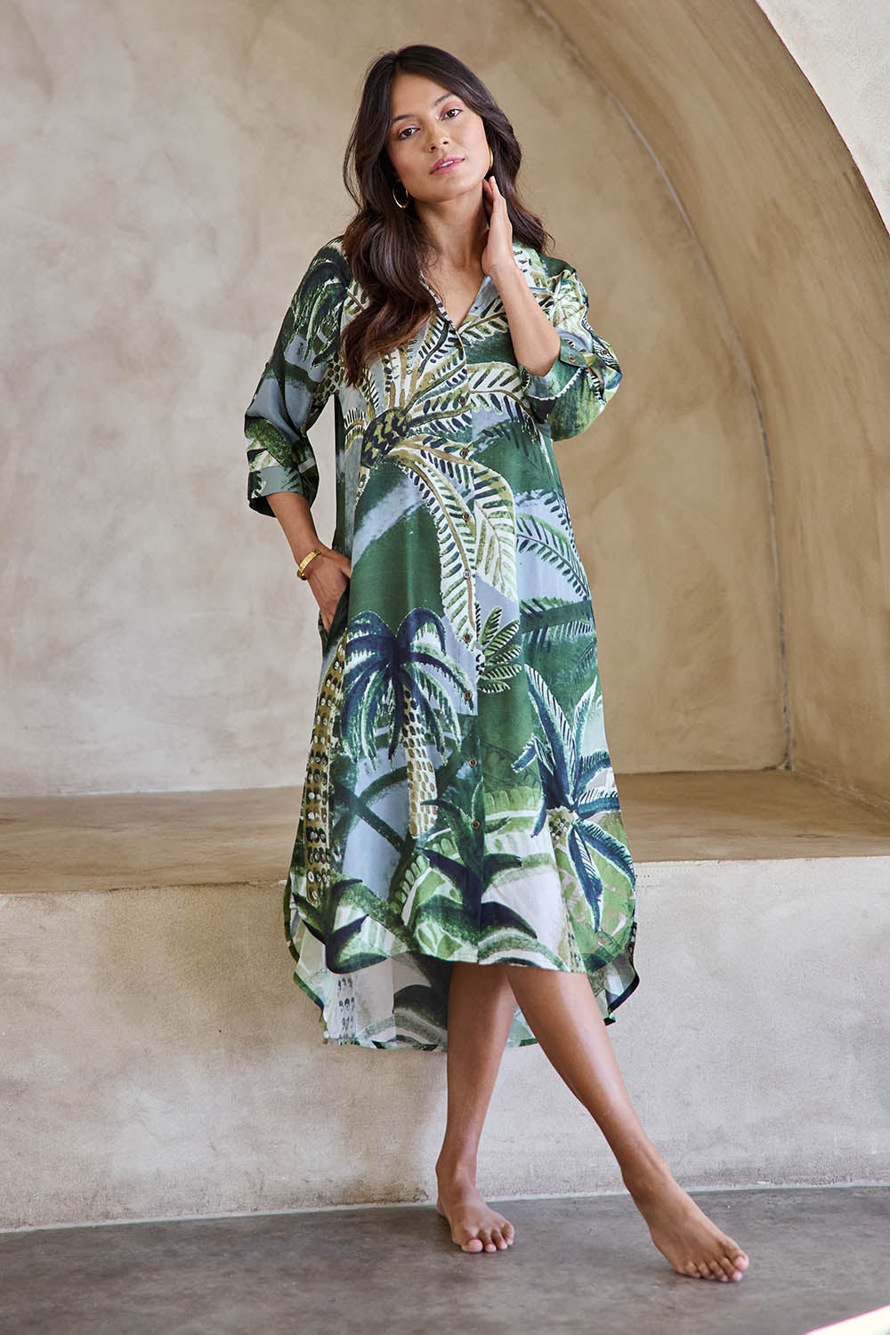 Model Tahneei wearing size 10 of the Sapphire Beach Shirt Dress – Tropical in colour Tropical, from the front