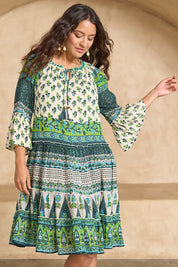 Model Tahnee wearing size 10 of the Angel Falls Dress in colour Green (Green), from the front, showing the whole outfit