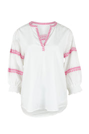 Product shot of the Magdelena River Cotton Blouse in colour Whitepink (White), from the front