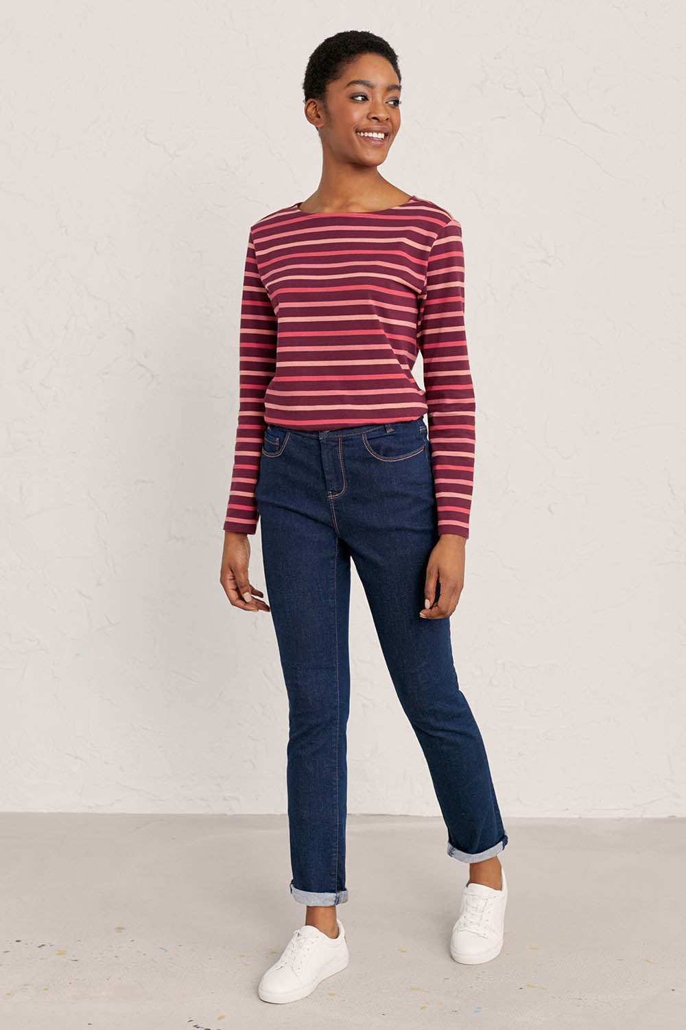 A model wearing the Lamledra Jeans in colour Dindigow (Blue), from the front, showing the whole outfit