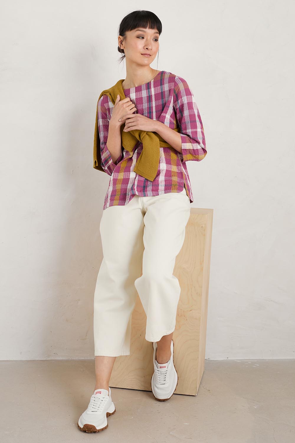 A model wearing the Riding High Top in colour Clover (Pink), from the front, showing the whole outfit