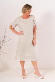 Model Genericm wearing size sample of the Envelope Sleeve Dress – Natural in colour Natural, from the front