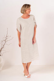 Model Genericm wearing size sample of the Envelope Sleeve Dress – Natural in colour Natural, from the front
