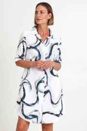 Model Riinar wearing size 10 of the Riverstone Shirtmaker Dress – Riverstone in colour Riverstone, in a cropped view