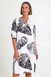 Model Riinar wearing size 10 of the Shell Button Front Dress – Shell in colour Shell, in a cropped view