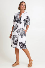 Model Riinar wearing size 10 of the Shell Button Front Dress – Shell in colour Shell, from the front
