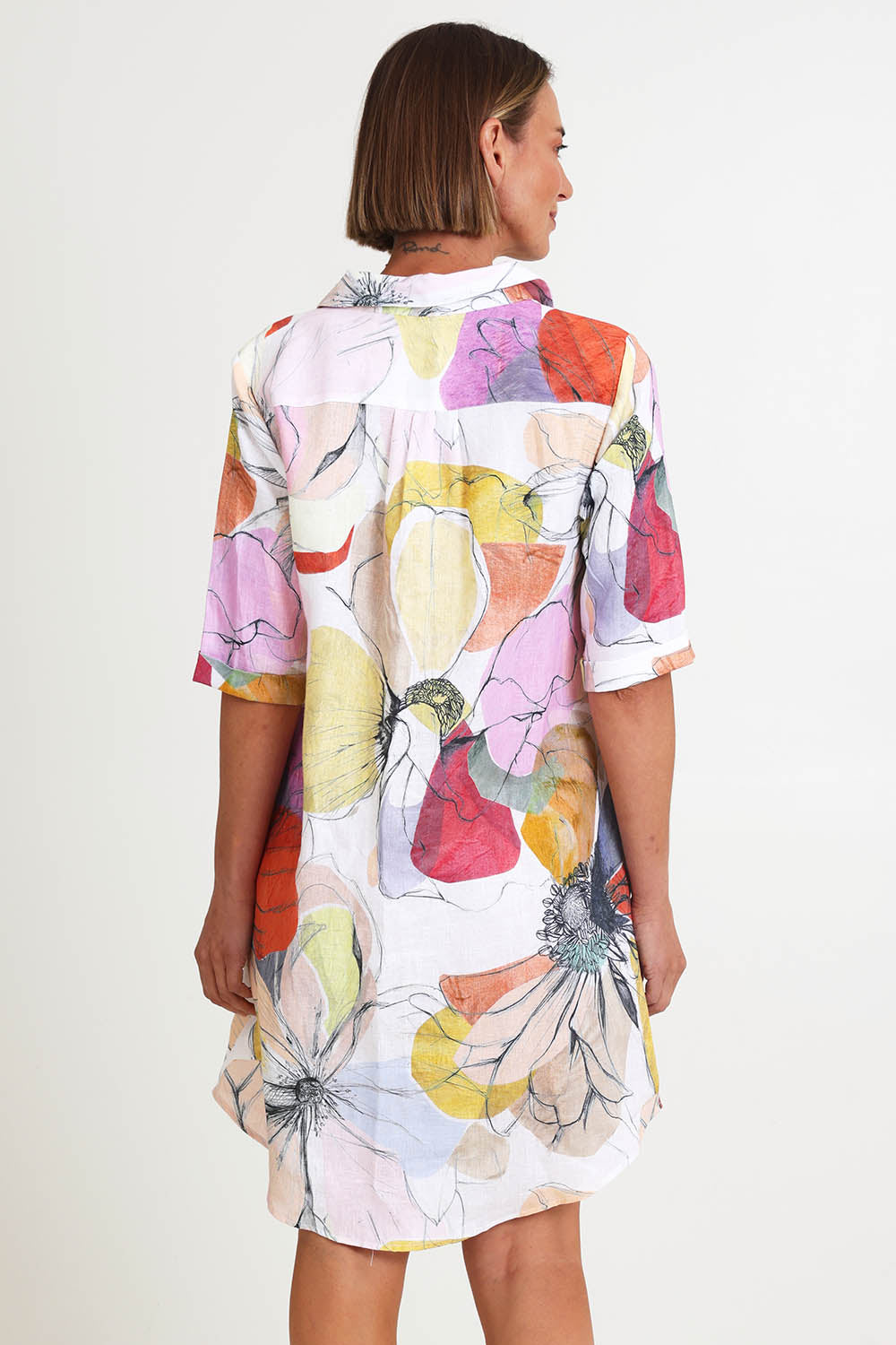 Model Riinar wearing size 10 of the Petal Shirtmaker Dress – Petal in colour Petal, from the back