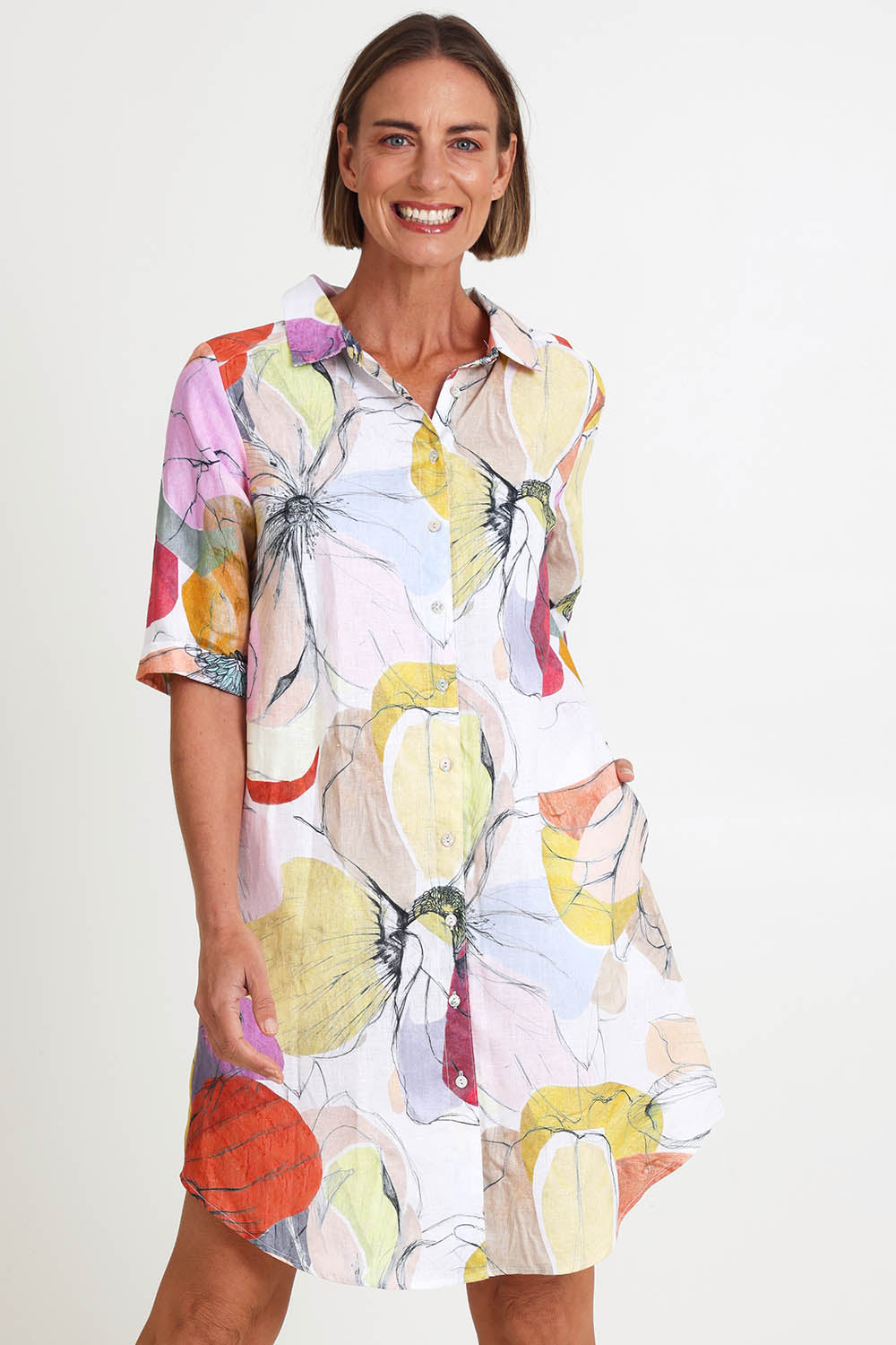 Model Riinar wearing size 10 of the Petal Shirtmaker Dress – Petal in colour Petal, in a cropped view