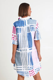 Model Riinar wearing size 10 of the Gallery Shirtmaker Dress – Gallery in colour Gallery, from the back