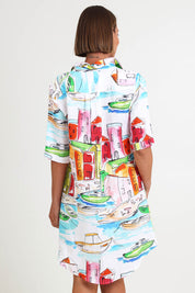 Model Riinar wearing size 10 of the Seaside Shirtmaker Dress – Seaside in colour Seaside, from an angle