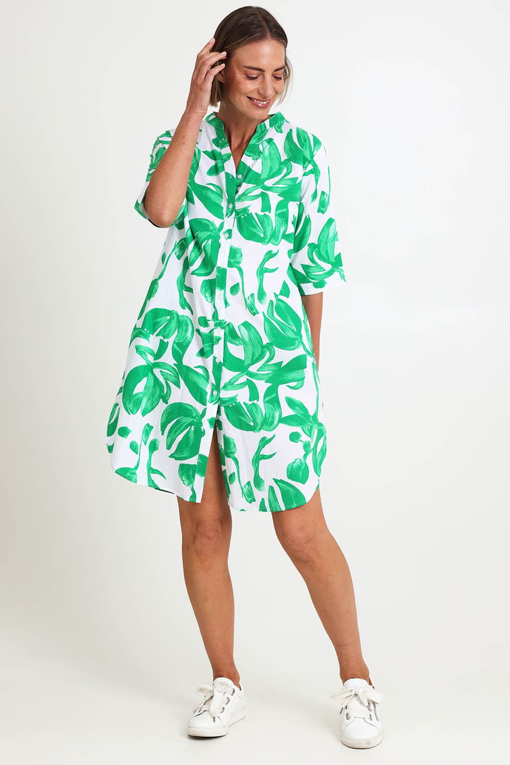 Model Riinar wearing size 10 of the Garden Shirtmaker Dress – Emerald in colour Emerald, from the front