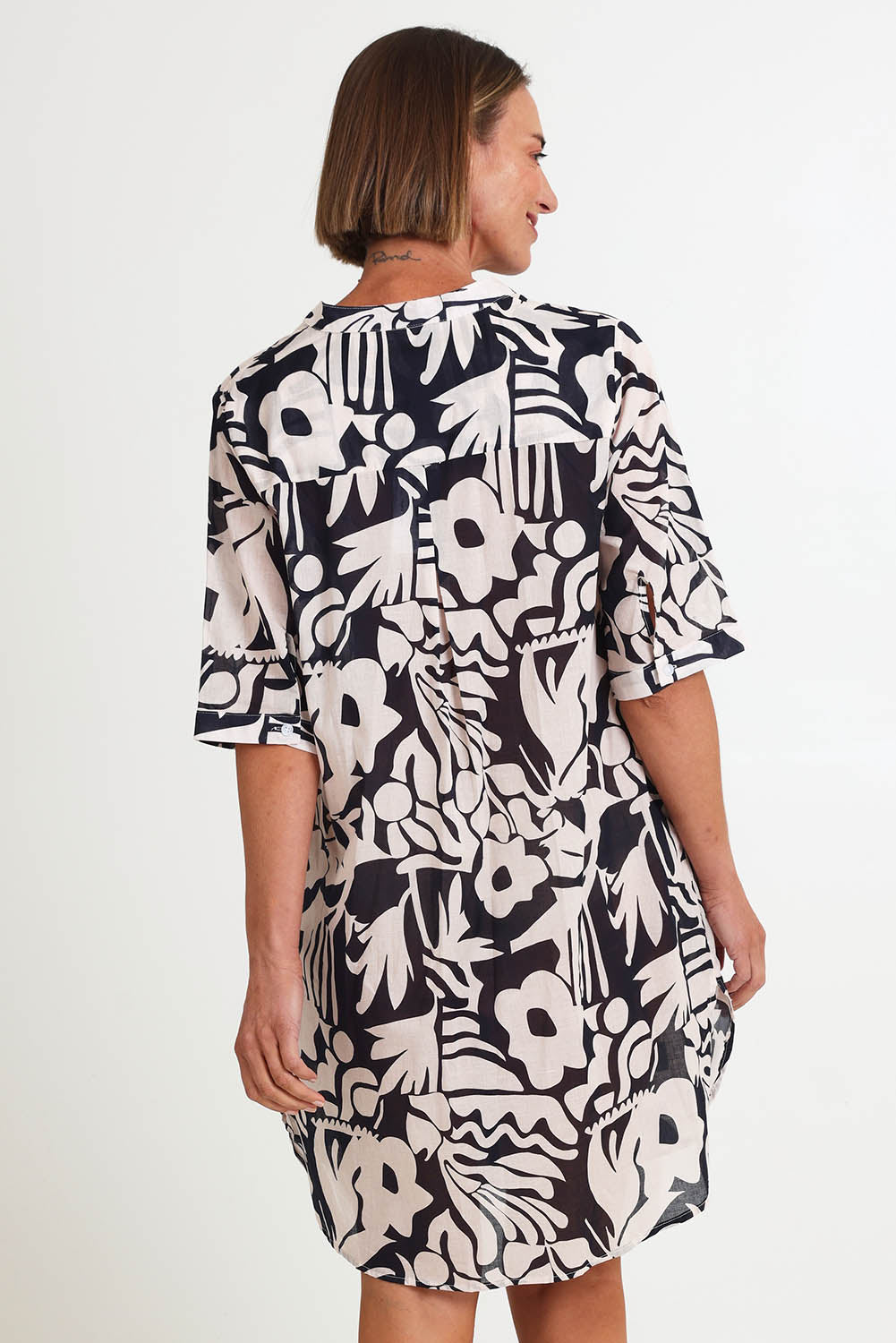 Model Riinar wearing size 10 of the Bloom Shirtmaker Dress – Midnight in colour Midnight, from an angle