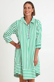 Model Riinar wearing size 10 of the 2 Way Stripe Dress – Green in colour Green, in a cropped view
