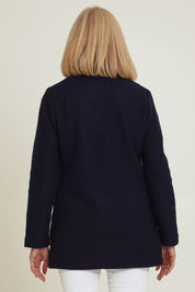 Model Sandy wearing size S of the Funnel Neck Boiled Wool Coat in colour Navy (Blue), from the back