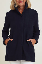Model Sandy wearing size S of the Funnel Neck Boiled Wool Coat in colour Navy (Blue), from the front, cropped image