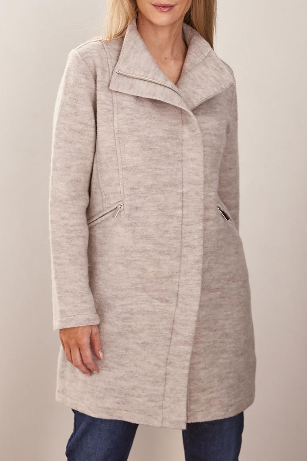 A model wearing the Longline Panel Zip Boiled Wool Coat in colour Natural, from the front, cropped image