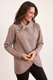 A model wearing the Moss Stitch Cowl Wool Sweater in colour Mocha, from the front, cropped image