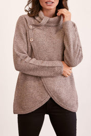 A model wearing the Moss Stitch Cowl Wool Sweater in colour Mocha, from the front, cropped image