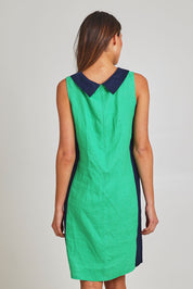 Model Madeline wearing size 10 of the Sl Cowl Neck Splice Shift Linen Dress in colour Greennavy (Green), from the back