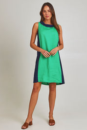 Model Madeline wearing size 10 of the Sl Cowl Neck Splice Shift Linen Dress in colour Greennavy (Green), from the front, showing the whole outfit