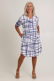 Model Sandy wearing size 10 of the Tokyo Soft V Neck Linen Dress in colour Tokyo, from the front, showing the whole outfit