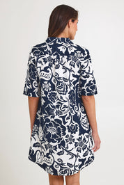 Model Madeline wearing size 10 of the Vine Linen Shirtmaker Dress in colour Vine (Blue), from the back